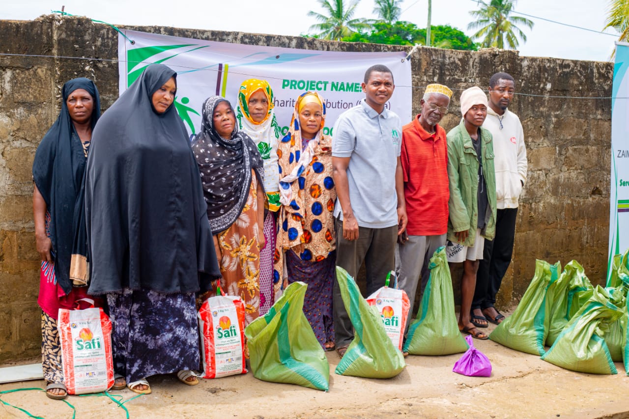 Charity Distribution project showing organized distribution of essential Safi brand food supplies to community members